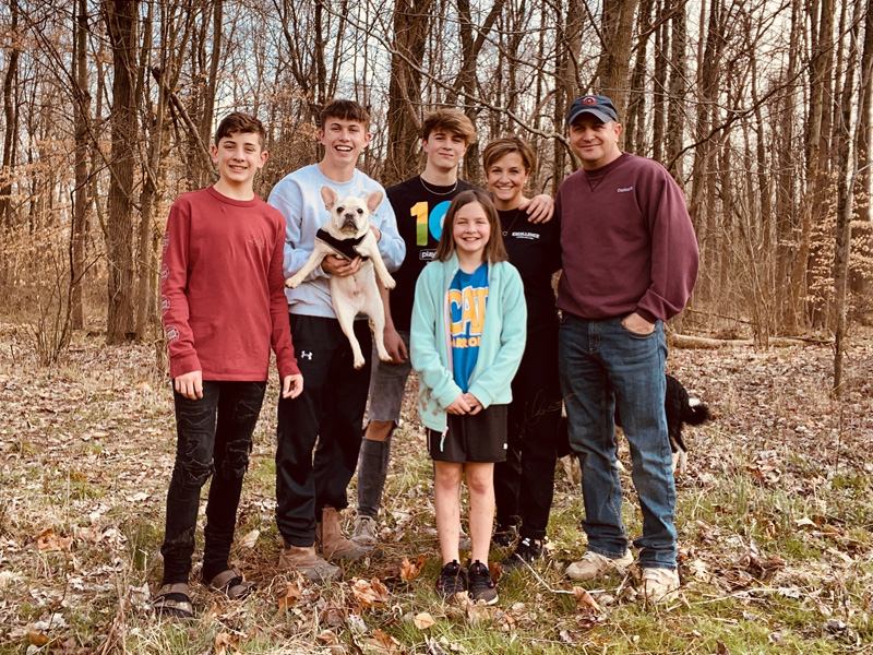 Hancock Family Photo in a Wooded Area at Hancock Farms